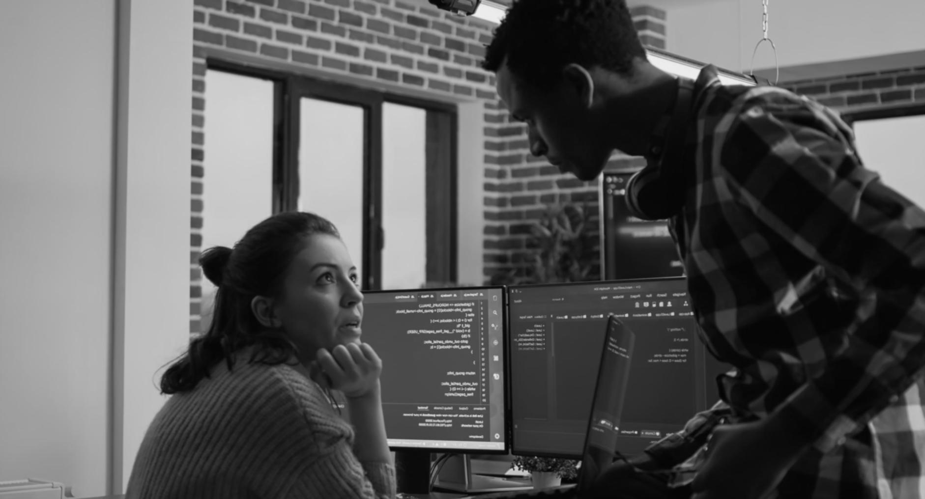 Development team collaborating on mobile app interface design